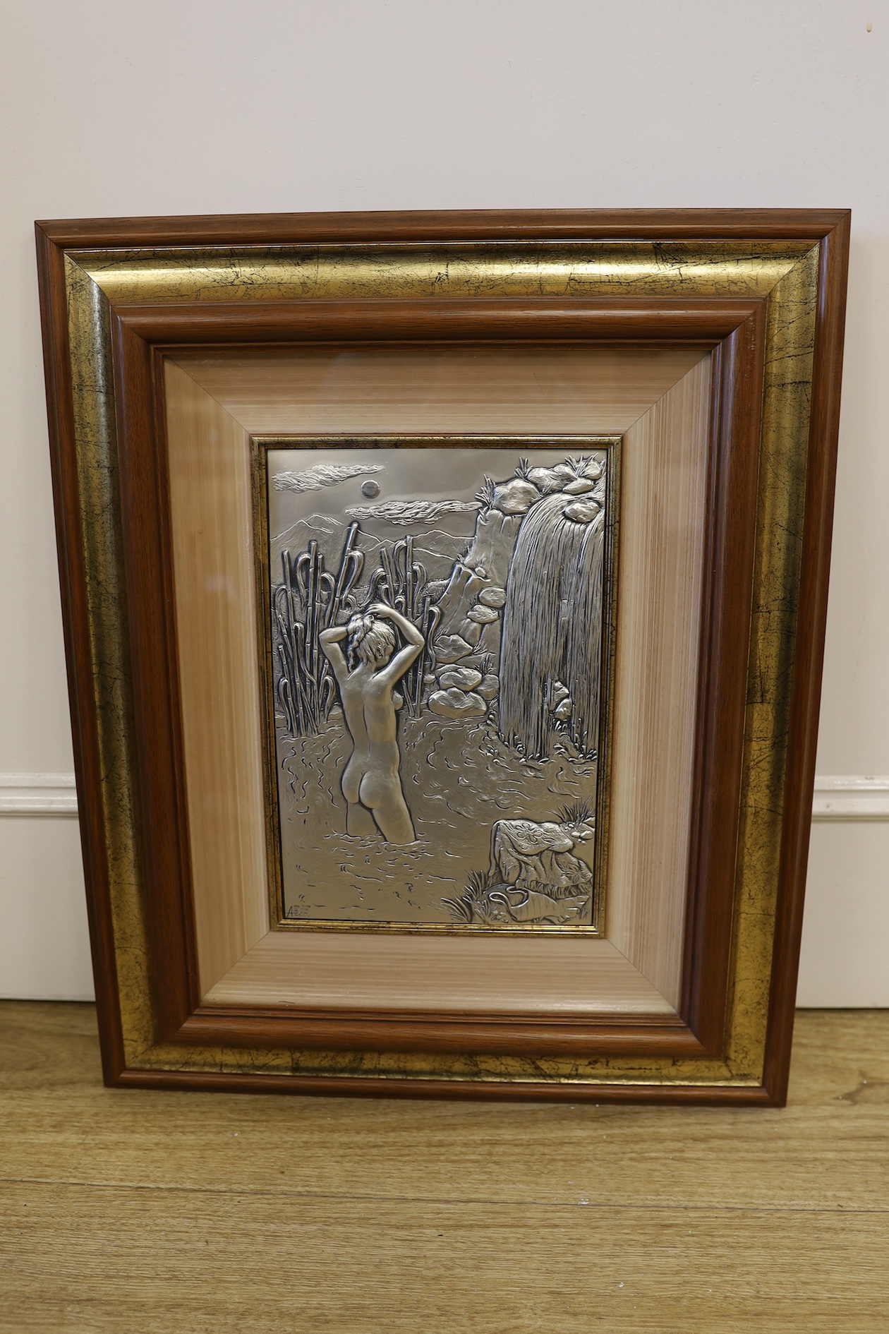 An Italian 925 framed silver plaque depicting a bathing nude lady, signed bottom left, certificate of authenticity to reverse, 27 x 18cm excl. frame. Condition - good